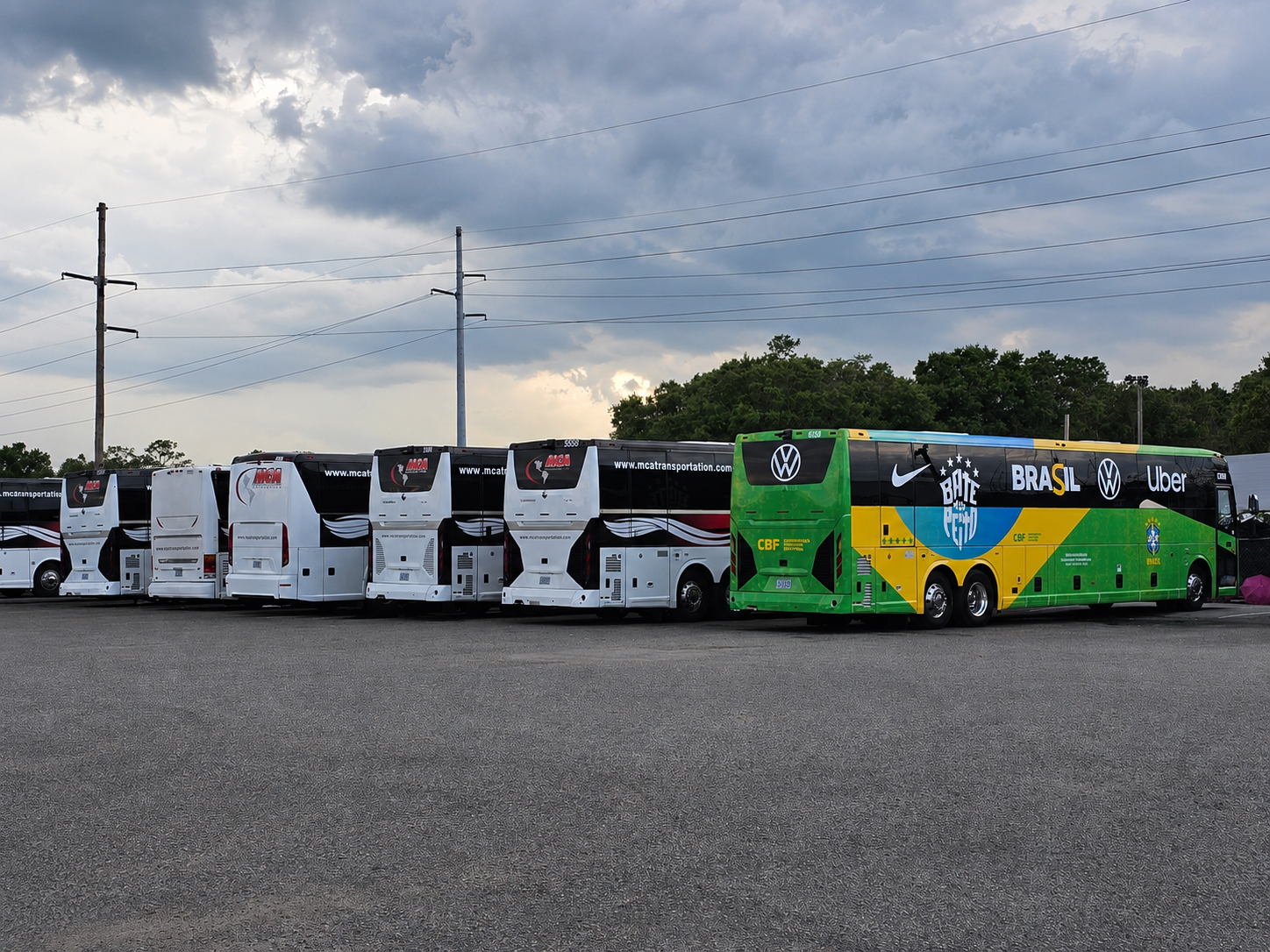 MCA Transportation fleet lineup with CBF Brazil National Team motorcoach