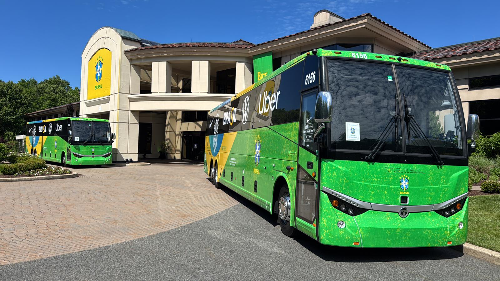 Two Brazil national team motorcoaches at the team hotel
