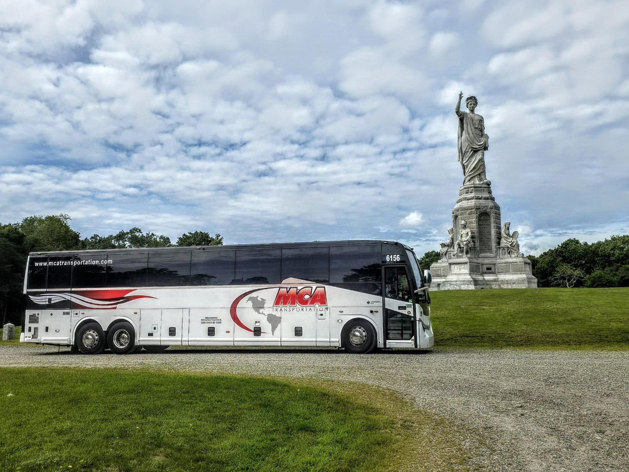 MCA Transportation motorcoach at the National Monument to the Forefathers in Plymouth, Massachusetts