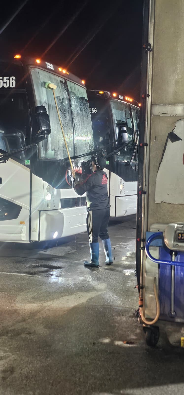 MCA Transportation overnight crew washing motorcoach windshields