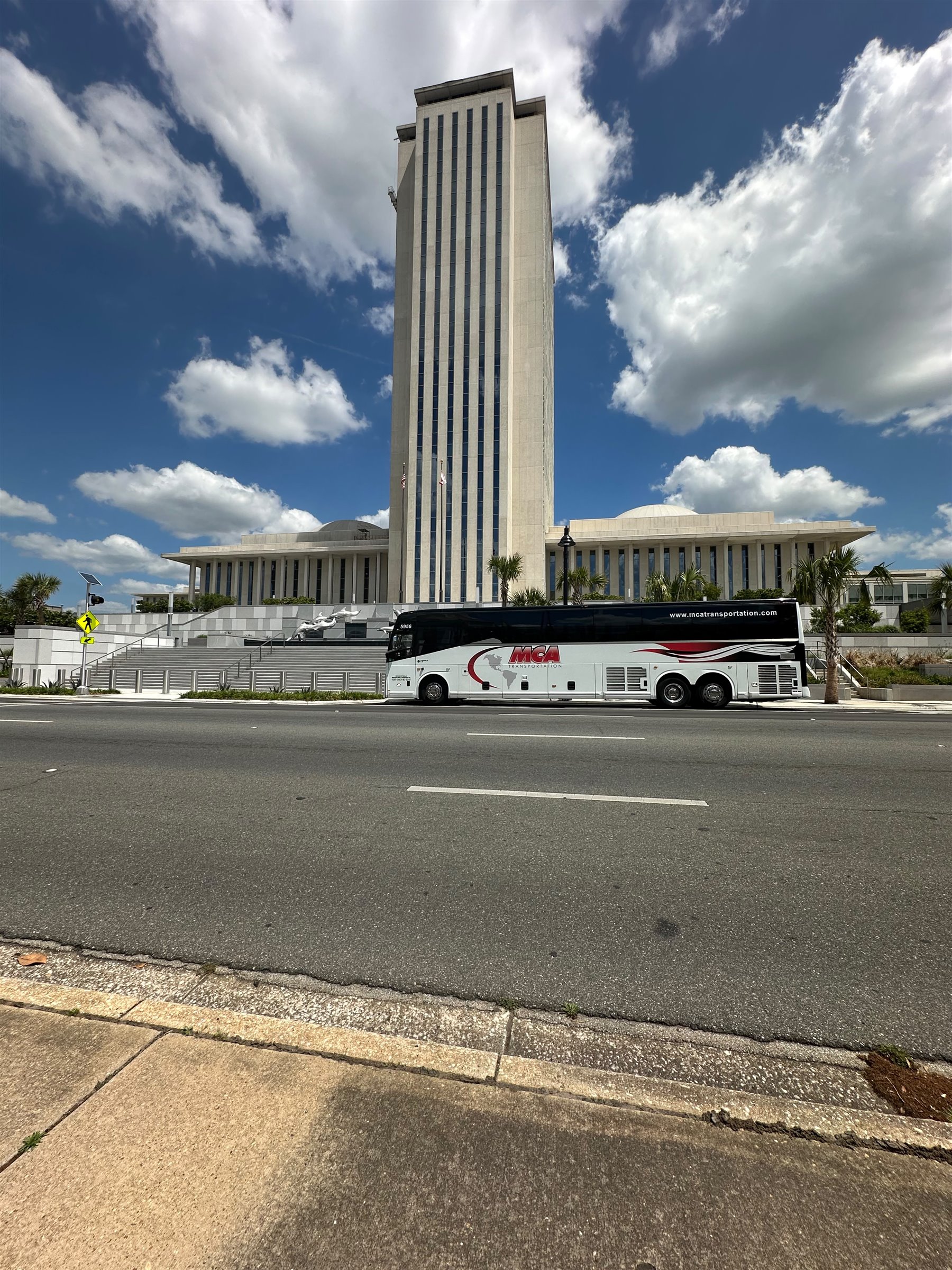MCA Transportation motorcoach at the Florida State Capitol in Tallahassee