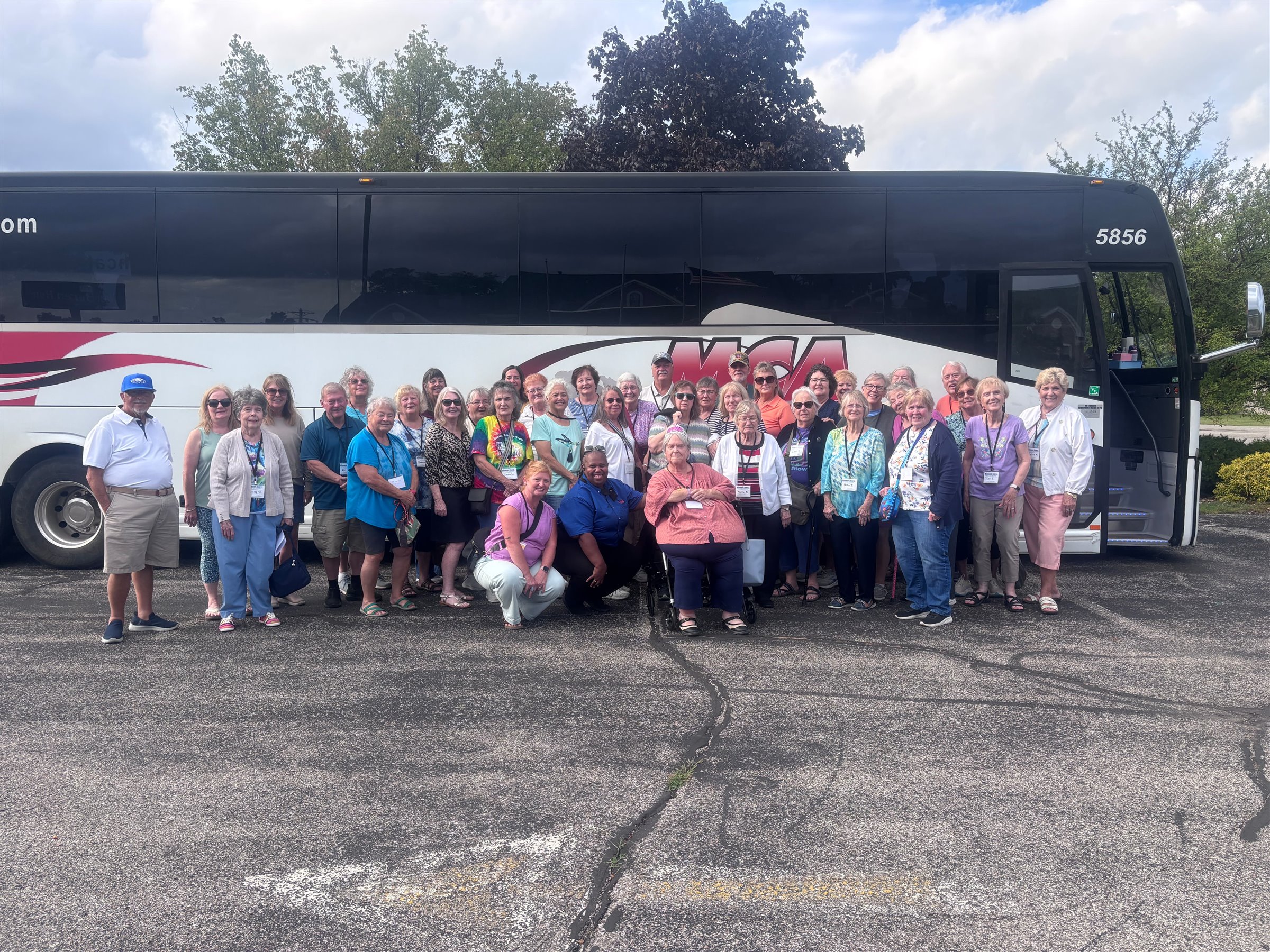 Senior travel group with an MCA Transportation motorcoach
